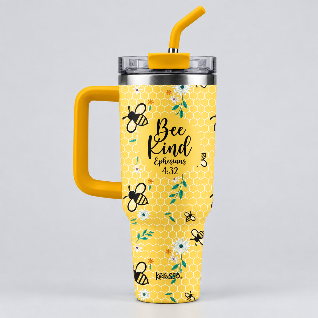 A yellow insulated tumbler with a honeycomb pattern, featuring illustrations of bees, white flowers, and the text 'Bee Kind Christians 4:37' on the front. The tumbler has a yellow handle, a clear lid, and a yellow straw, shown on a plain white background.