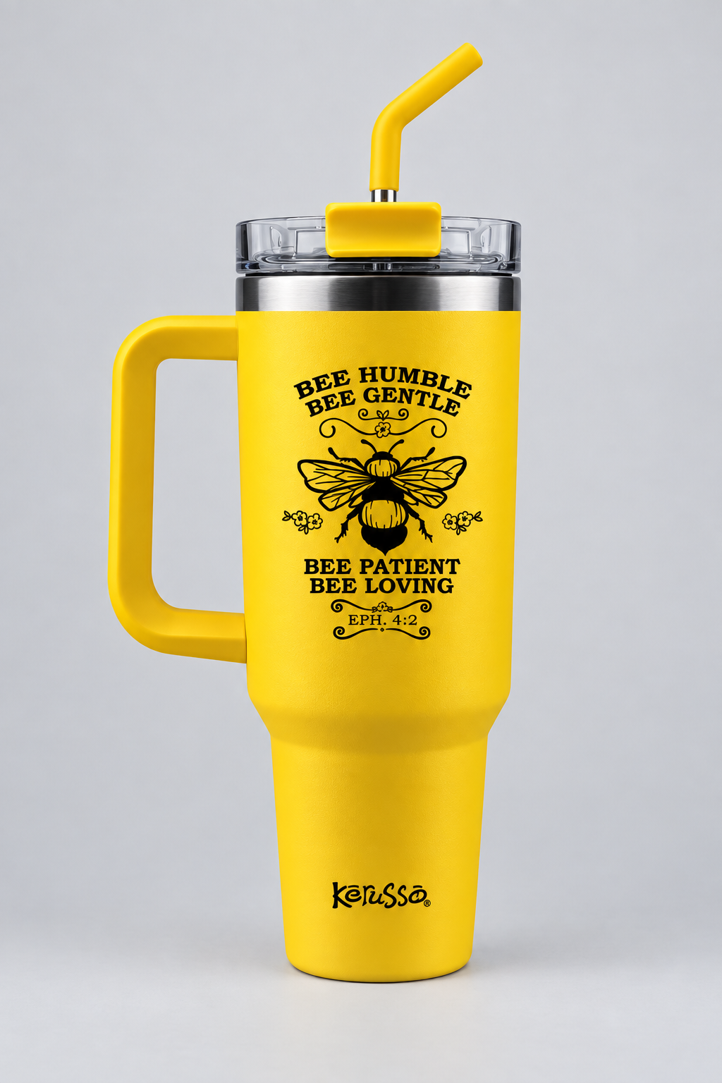 A bright yellow insulated travel tumbler with a handle, clear lid, and yellow straw on a plain white background. The tumbler features a black printed bee graphic and the text 'BEE HUMBLE BEE GENTLE BEE PATIENT BEE LOVING' with 'KARSSA' near the bottom.